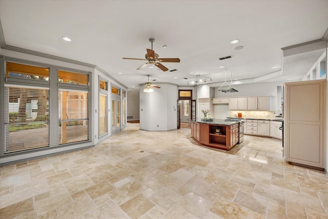 kitchen featuring stone tile floors, open shelves, gas range, open floor plan, and ceiling fan