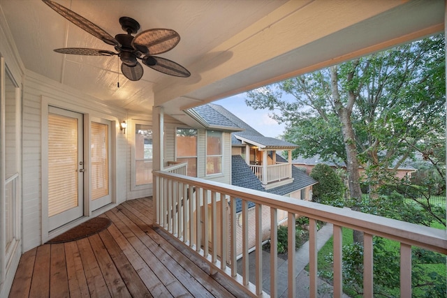 wooden deck with ceiling fan