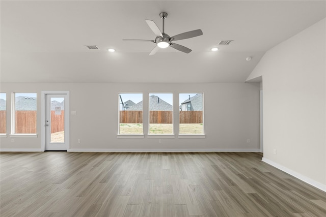 interior space featuring visible vents, wood finished floors, and recessed lighting