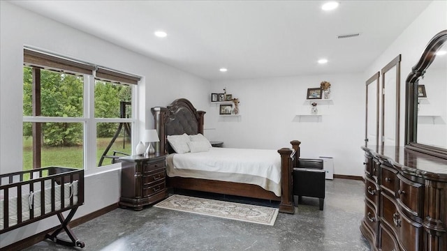 bedroom featuring multiple windows