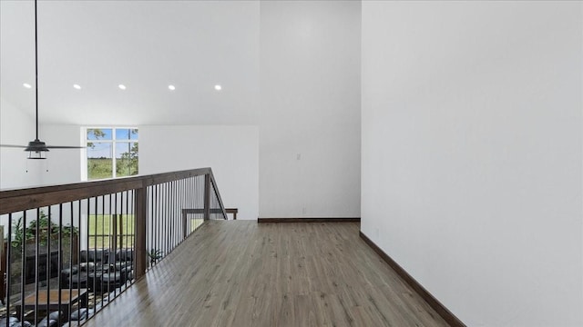 hallway featuring wood-type flooring