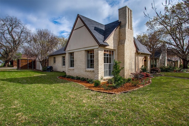 view of home's exterior with a yard