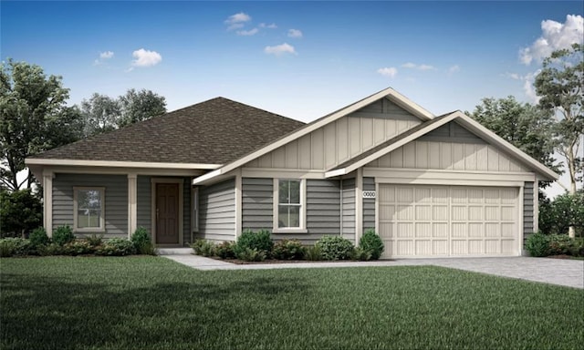 view of front of property featuring a garage and a front lawn