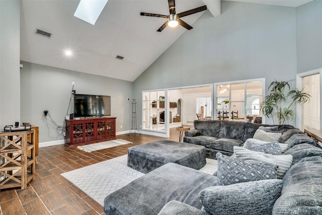 living room featuring ceiling fan, beamed ceiling, high vaulted ceiling, and dark wood-type flooring