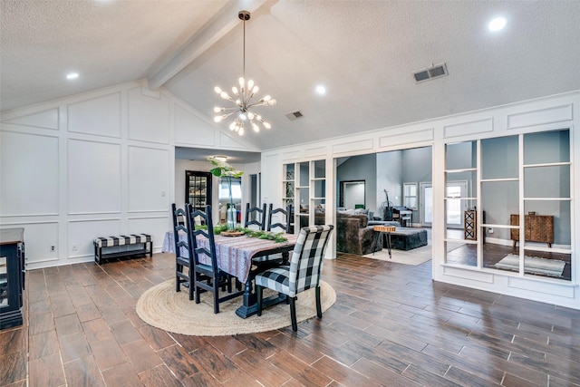 dining space featuring french doors, a textured ceiling, a notable chandelier, vaulted ceiling with beams, and dark hardwood / wood-style floors