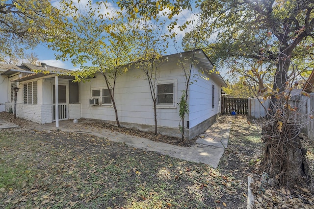 view of side of property featuring cooling unit