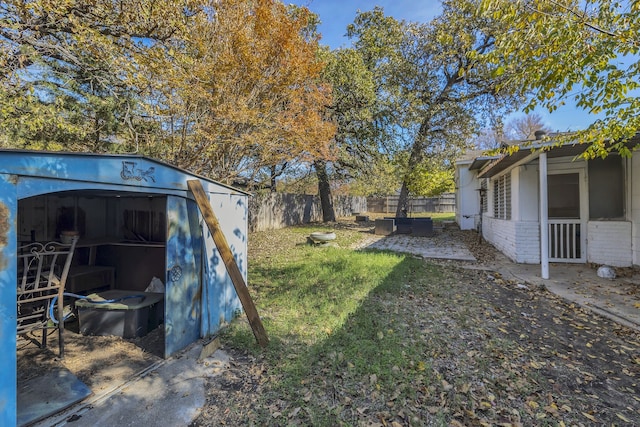 view of yard with an outdoor structure