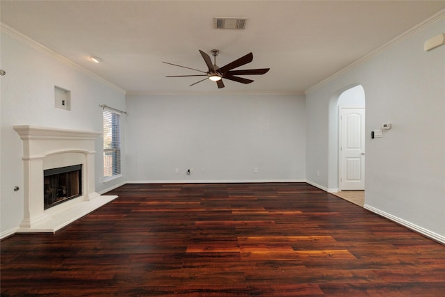 unfurnished living room with dark hardwood / wood-style floors, ceiling fan, and crown molding