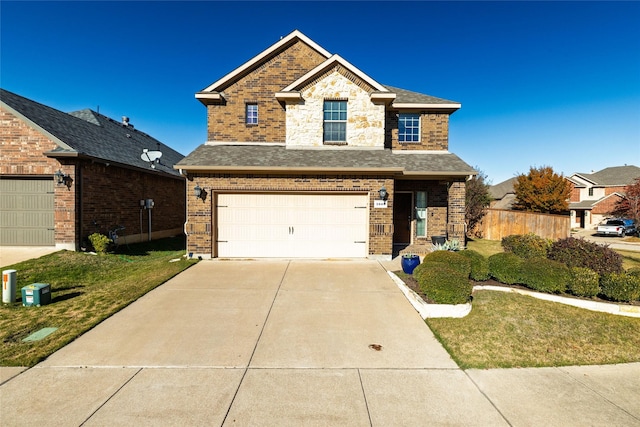 front facade featuring a garage and a front lawn