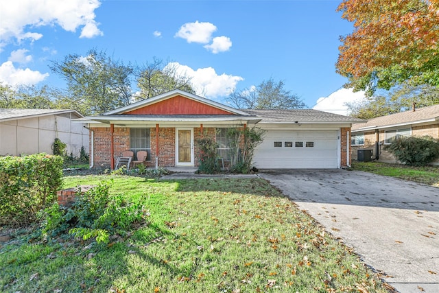 ranch-style house featuring a porch, cooling unit, a front yard, and a garage