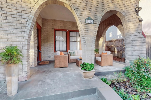 doorway to property with a patio