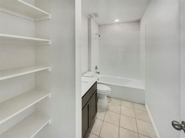 full bathroom featuring washtub / shower combination, vanity, toilet, and tile patterned floors