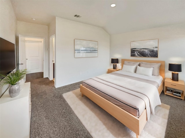 carpeted bedroom featuring lofted ceiling