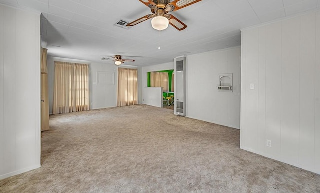 unfurnished living room with carpet and ceiling fan