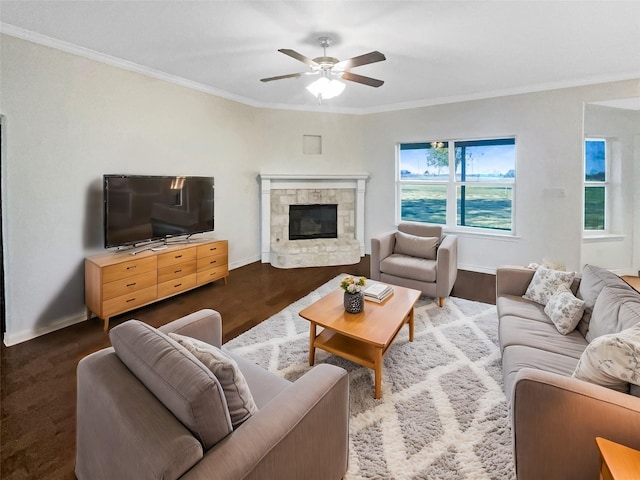 living room with ceiling fan, dark hardwood / wood-style flooring, and crown molding