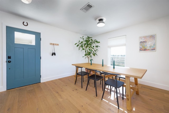 dining area featuring wood-type flooring