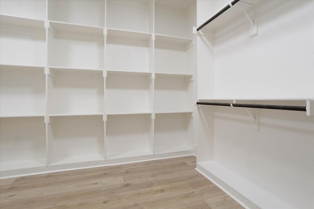 walk in closet featuring light wood-type flooring