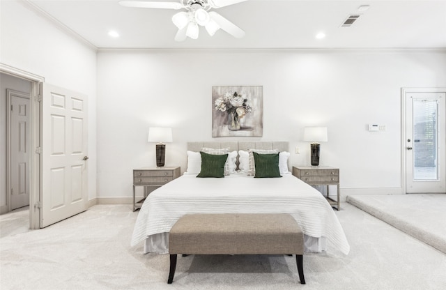 bedroom with crown molding, light carpet, and ceiling fan