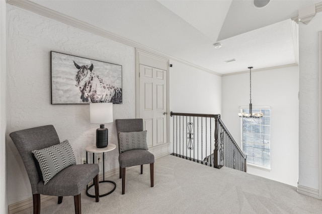 living area with crown molding, lofted ceiling, carpet floors, and a notable chandelier