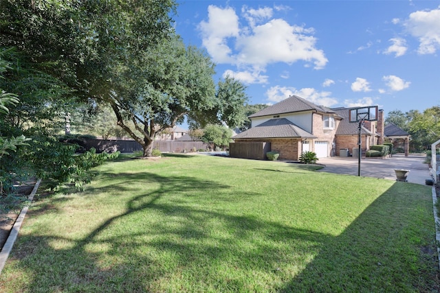 view of yard featuring a garage