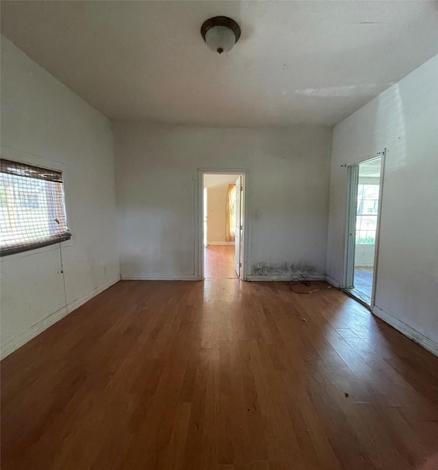 empty room featuring hardwood / wood-style floors