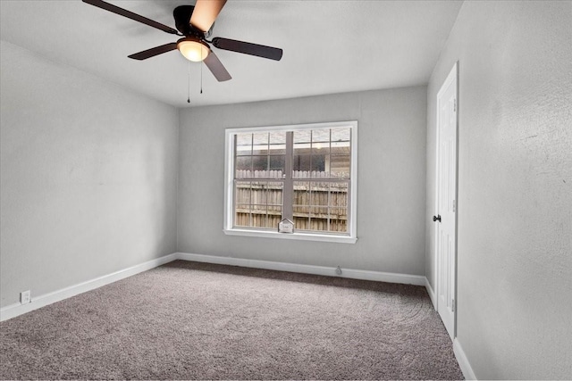 unfurnished room featuring carpet floors and ceiling fan