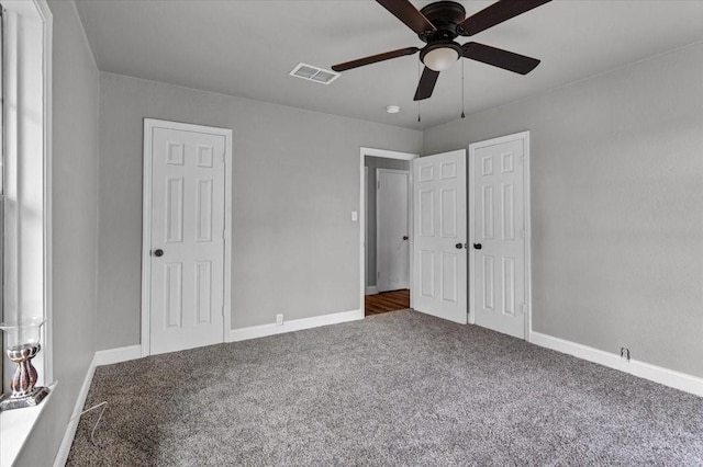 unfurnished bedroom with carpet and ceiling fan