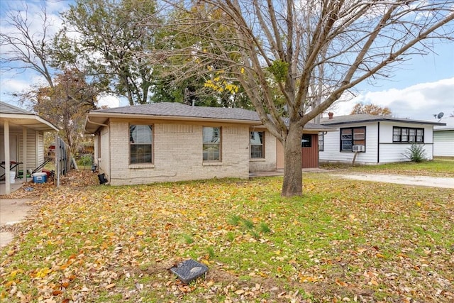 view of front facade with a front lawn