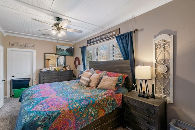 bedroom with carpet, ceiling fan, and crown molding