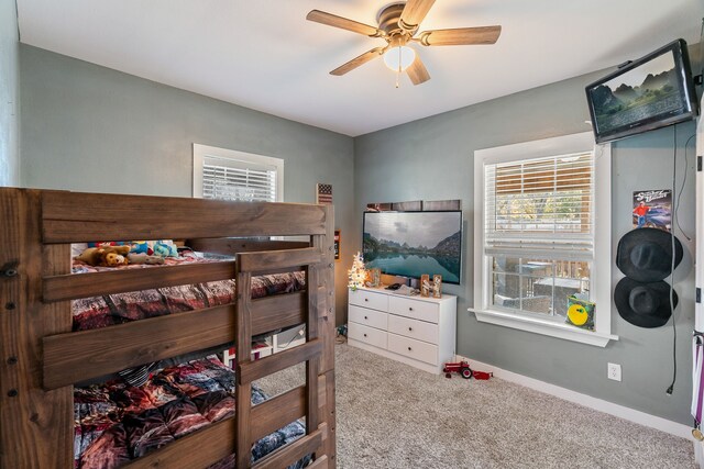 bedroom featuring ceiling fan and carpet floors