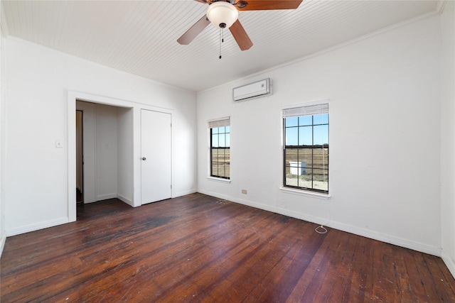 unfurnished bedroom featuring a closet, ceiling fan, dark hardwood / wood-style flooring, and a wall mounted air conditioner