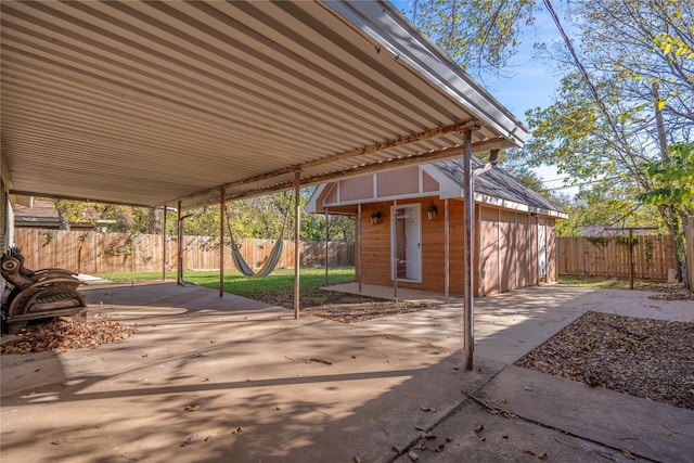 view of patio featuring an outdoor structure