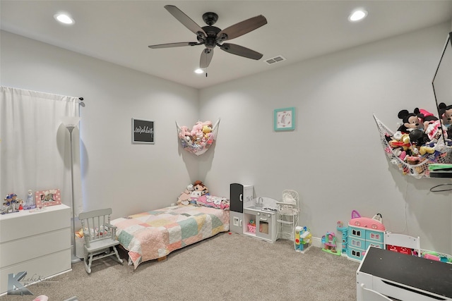 carpeted bedroom with ceiling fan