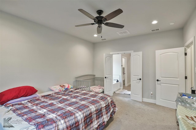 carpeted bedroom featuring ceiling fan