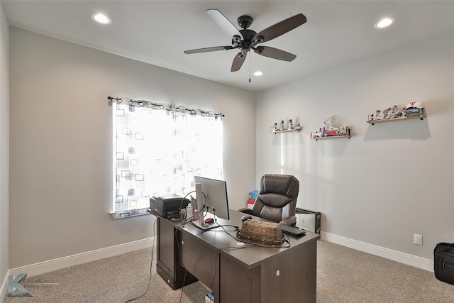 carpeted home office with ceiling fan