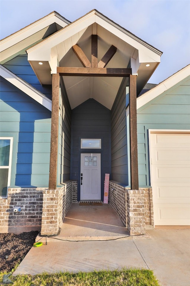 property entrance with a garage