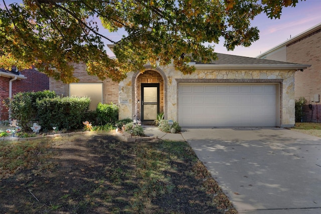 view of front of house with a garage