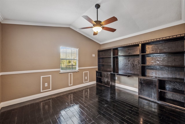 empty room with ceiling fan, vaulted ceiling, ornamental molding, and wood-type flooring