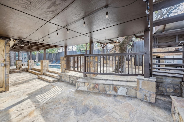 view of patio / terrace featuring a fenced in pool