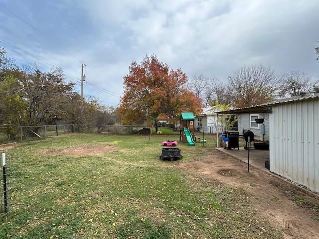 view of yard featuring a playground