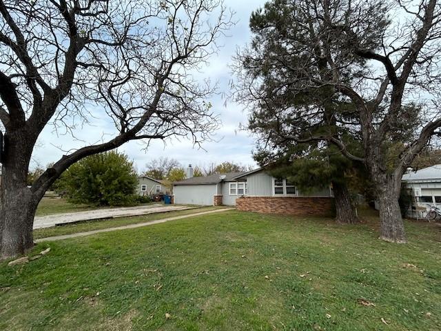 exterior space with a front yard