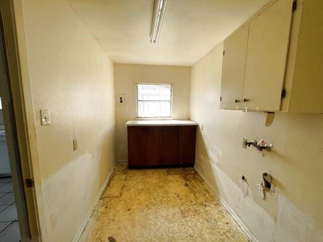 bathroom featuring baseboards