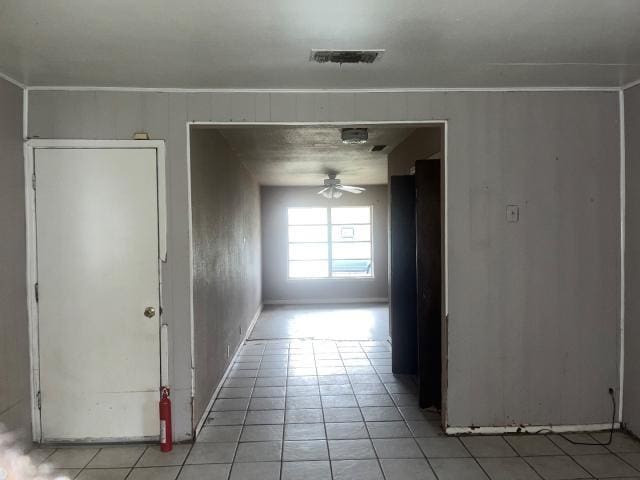 hallway with light tile patterned floors