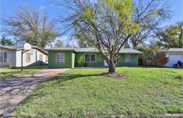 ranch-style home featuring a front yard