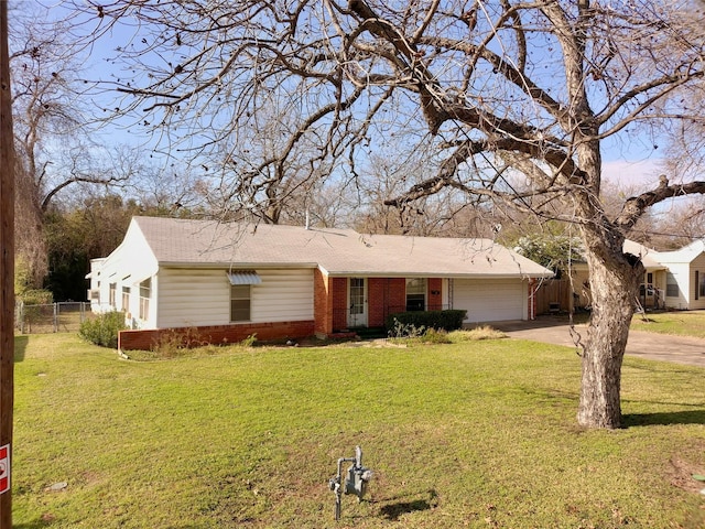 single story home featuring a front yard and a garage