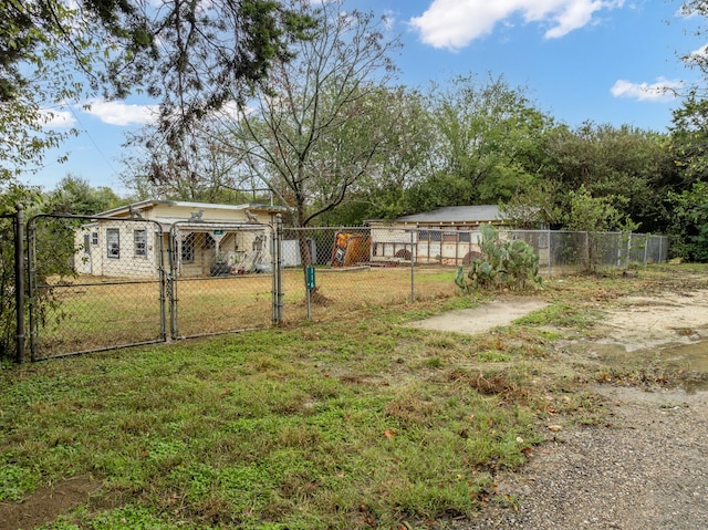 116 Fox Run, Whitney, TX 76692 - view of yard featuring a gate
