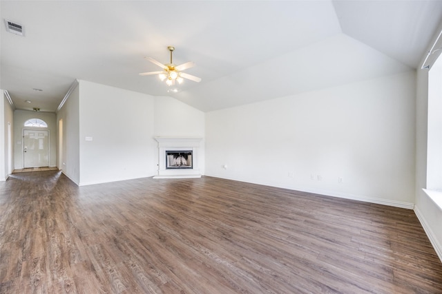 unfurnished living room featuring ceiling fan, lofted ceiling, and dark wood-type flooring