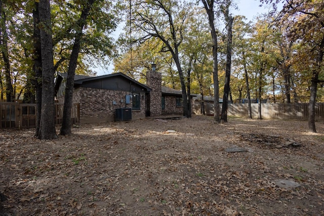 view of yard featuring central AC unit