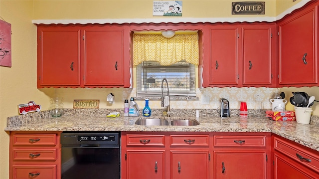 kitchen featuring tasteful backsplash, light stone countertops, sink, and black dishwasher