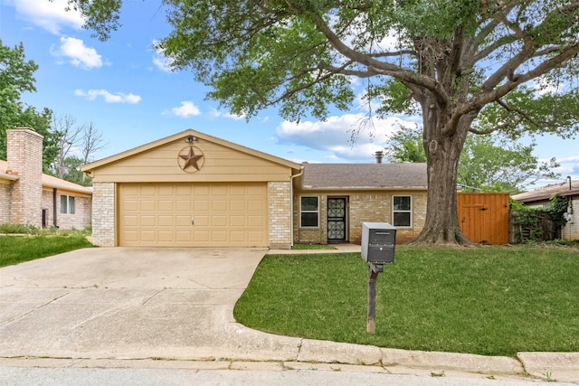 ranch-style house featuring a garage and a front lawn